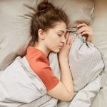 woman-sleeping-with-blanket-2021-08-29-23-37-30-utc-min-scaled